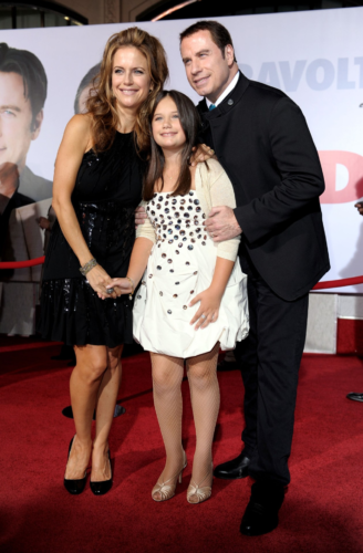 "LOS ANGELES, CA - NOVEMBER 09: Actors John Travolta (R), wife Kelly Preston (L) and their daughter Ella Bleu Travolta arrive at the premiere of Walt Disney Pictures' \"Old Dogs\" at the El Capitan Theater on November 9, 2009 in Los Angeles, California. (Photo by Kevin Winter/Getty Images)"
